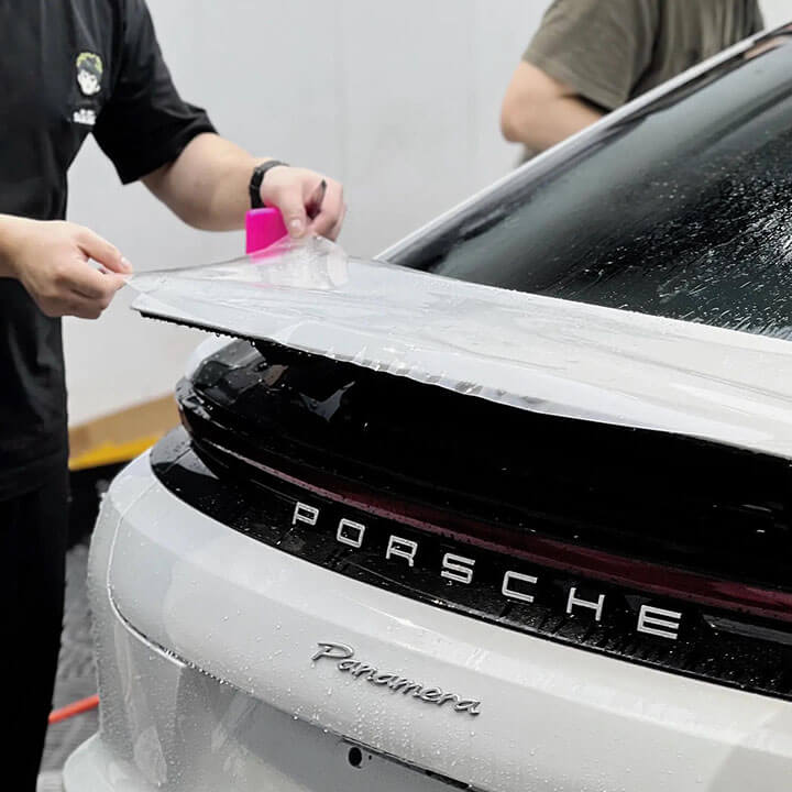Clear Paint protection film on white Porsche