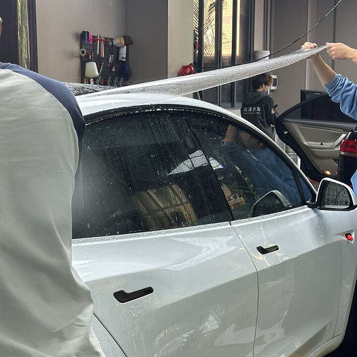 White Tesla gloss PPF installation